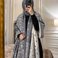 Slate grey and ivory paisley reversible woolen wrap styled over a black modest outfit