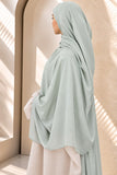 Soft mint extra-large modal hijab by Aynn Alif, featuring extremely soft, breathable fabric and an elegant drape.