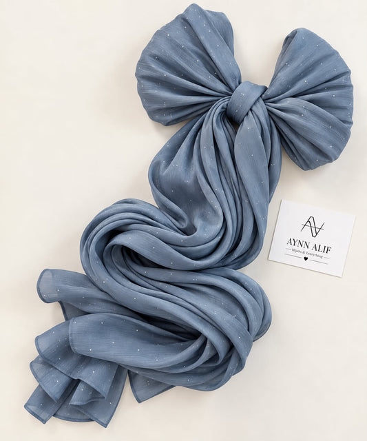 Steel blue stones-studded matte silk hijab with a soft flowy drape and delicate stone embellishments by Aynn Alif.
