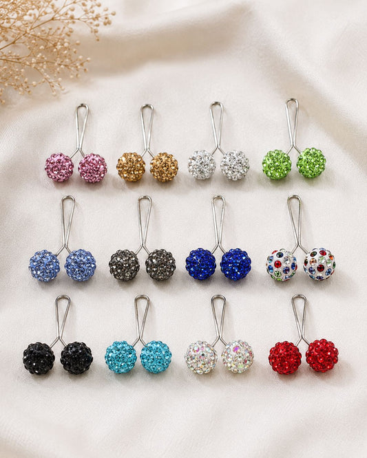 Stones studded loop pin for hijab styling featuring sparkling crystal accents and smooth silver glider design, secure snag-free scarf accessory.