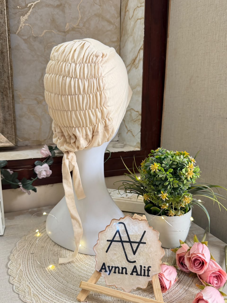 Vanilla ruched tie back hijab cap made from soft breathable jersey with full head coverage and adjustable tie-back by Aynn Alif.