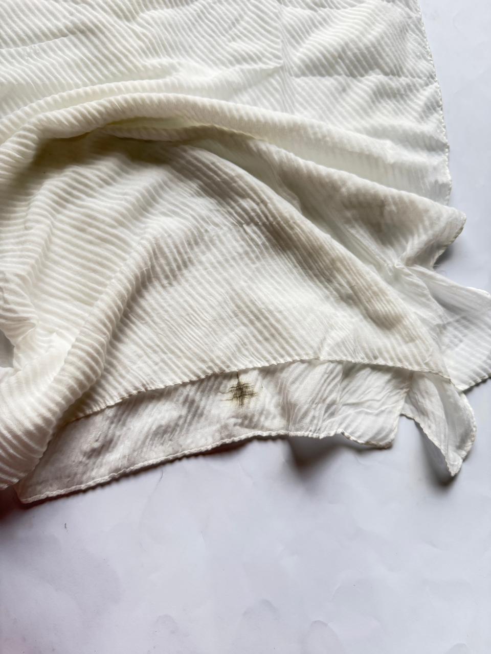 White Bubble Pleated Lawn Hijab with a slight stain, featuring lightweight breathable fabric and elegant pleated texture at a discounted price.