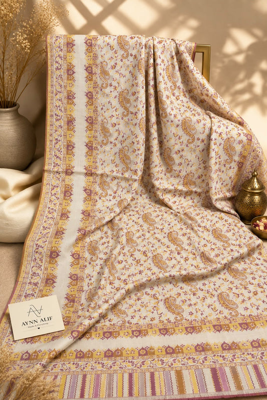 Yellow and berry red Kashmiri Kani shawl with an ivory base, intricate paisley motifs, delicate floral patterns and decorative borders by Aynn Alif Pakistan
