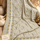 Yellow green Kashmiri Kani shawl with an ivory base, intricate paisley motifs, floral patterns and mustard yellow and sage green decorative borders by Aynn Alif Pakistan