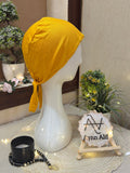 Yellow hijab cap side profile mannequin