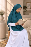 Girl wearing a Zinc colour Aynn Alif teens jersey makhna scarf with adjustable back elastic, designed for a secure and comfortable fit for ages 11–16.