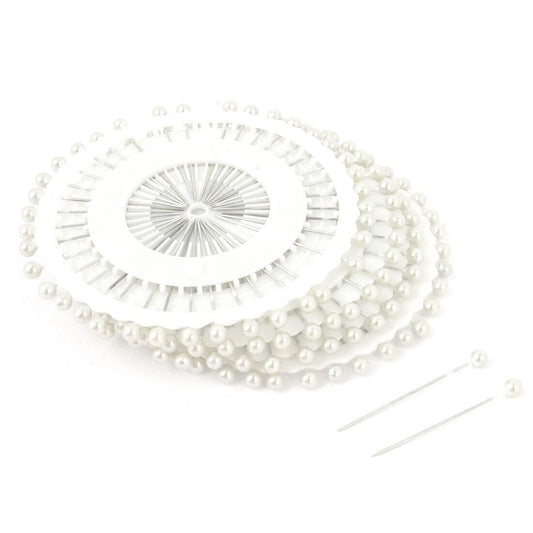 White pinwheel hijab pins by Aynn Alif Pakistan featuring 30 premium white scarf pins for everyday hijab styling.