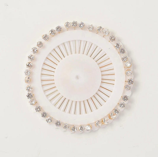 
White stone studded pinwheel hijab pins with 30 embellished scarf pins for elegant hijab styling.